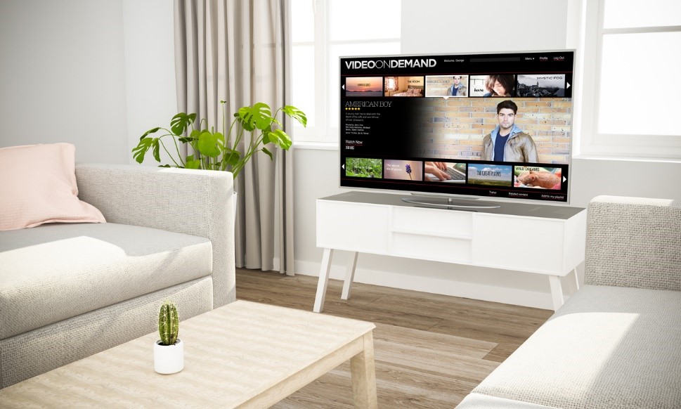 Wall mounted Smart TV showing video streaming app