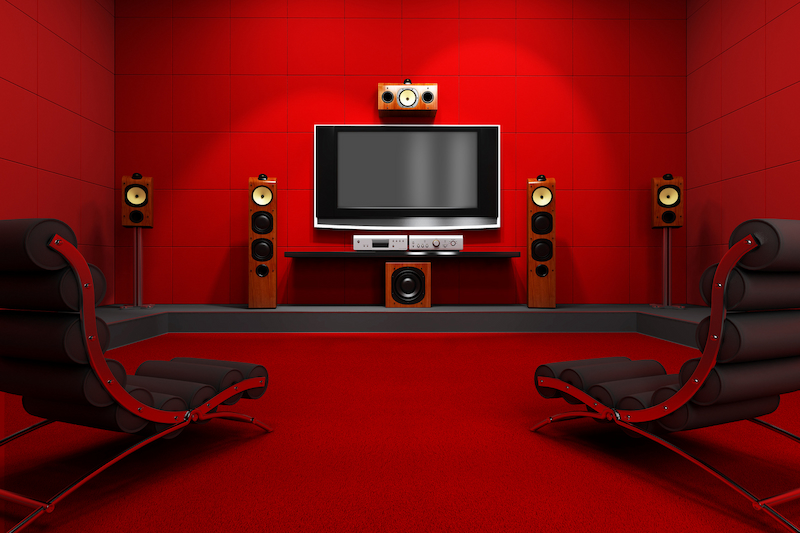 A red and black games room with entertainment system